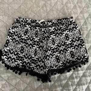 Pull on short with pom pom Size Medium